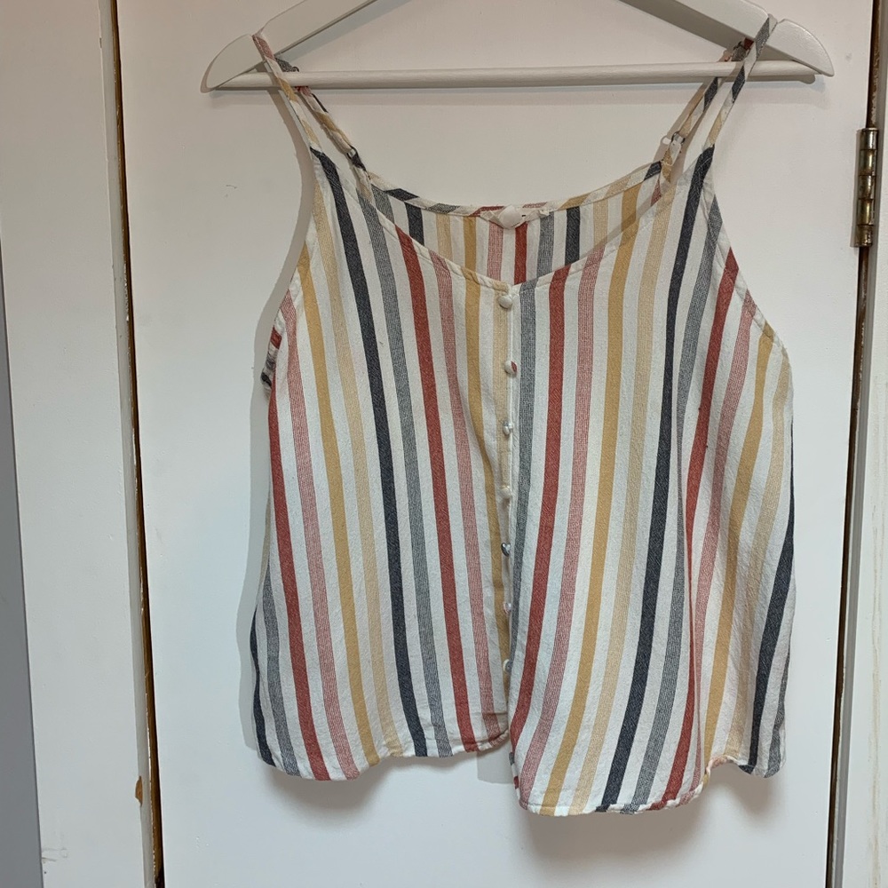 Mine brand strapped tanks Size M but fits like a S
